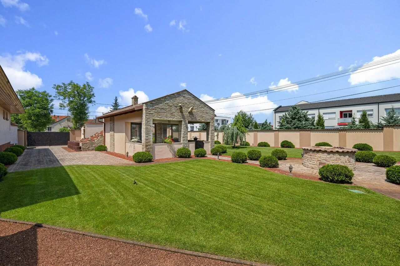 Manicured garden with ornamental plants in front of the house