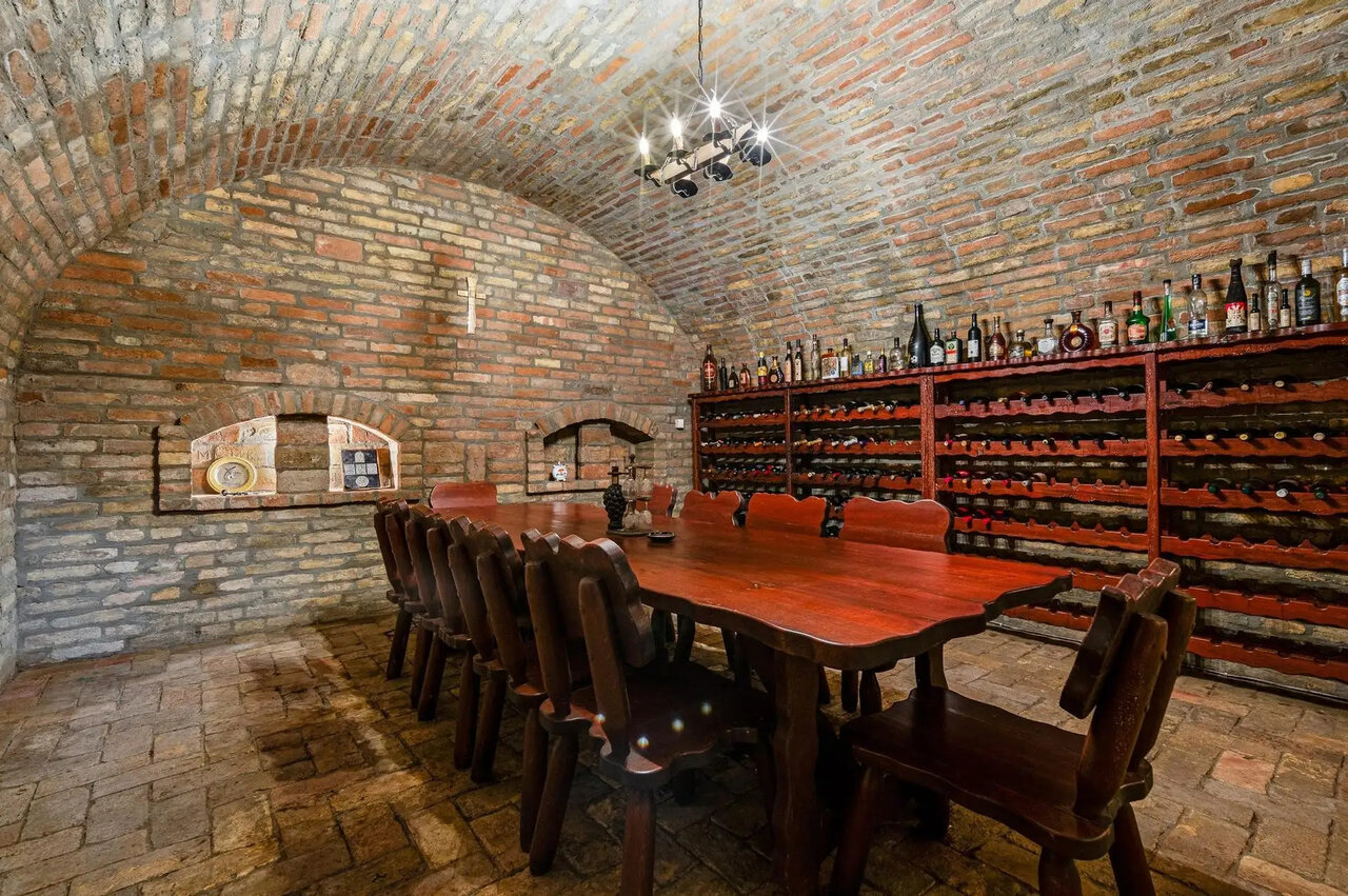 Atmospheric arched brick wine cellar