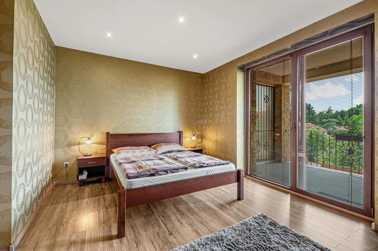 Modern bedroom with balcony access