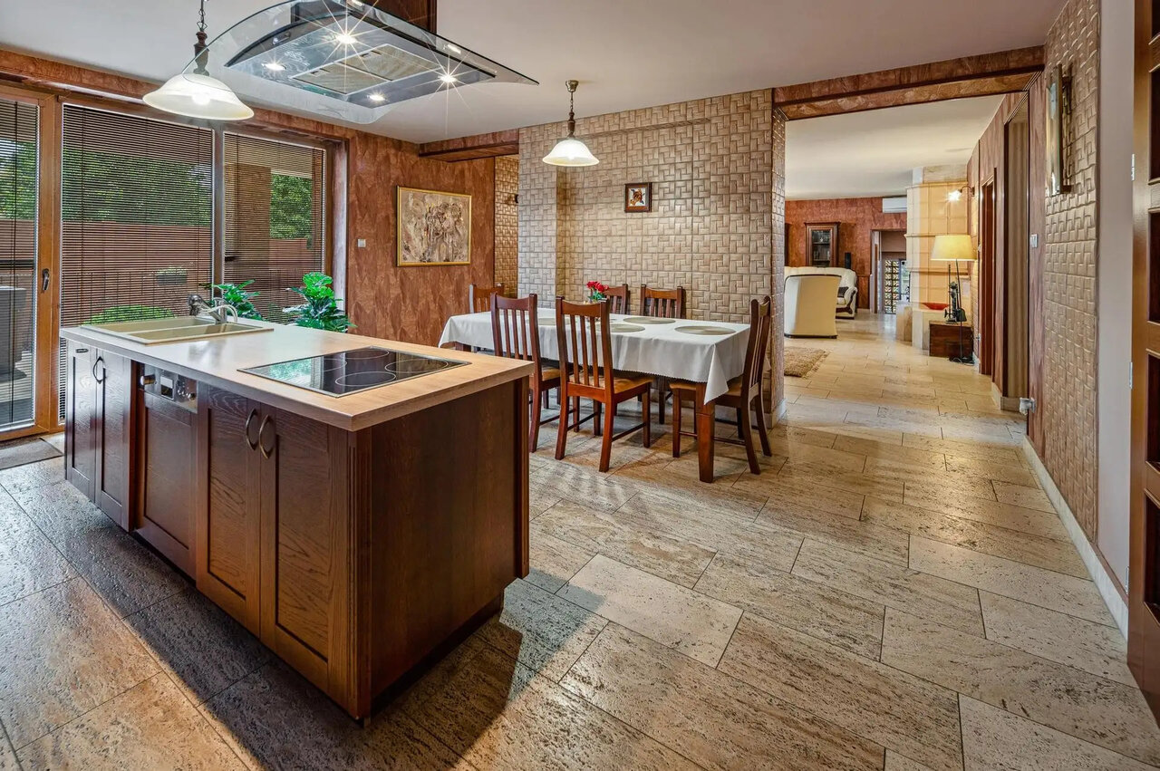 Open kitchen and dining area with living room
