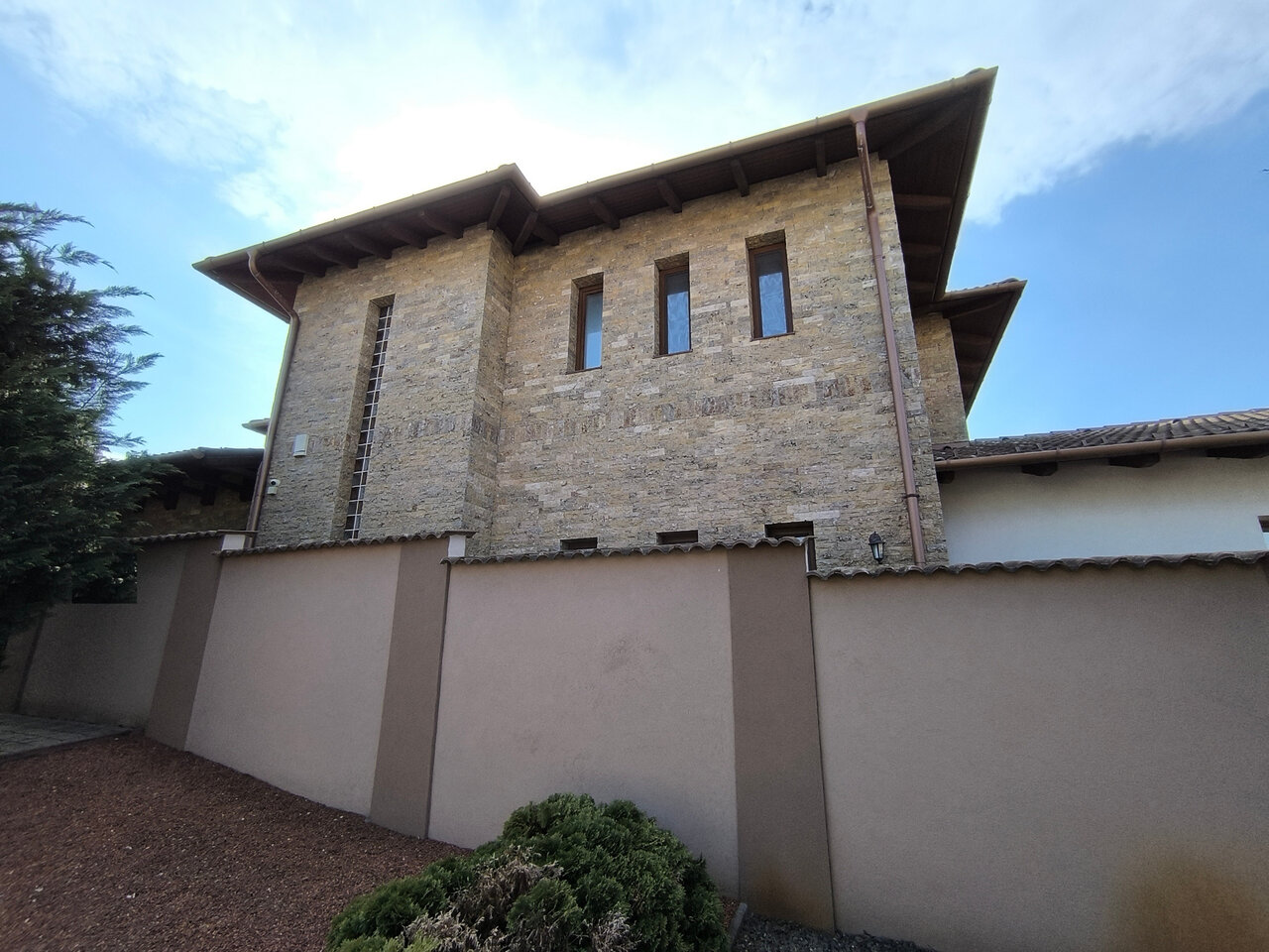 Modern stone-clad facade